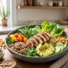 7 high-protein salad recipes with chicken, quinoa, chickpeas, vegetables, avocado, and healthy toppings.