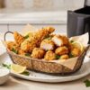 Golden crispy air fryer chicken tenders and chicken bites served with dipping sauces for a quick 10-minute dinner